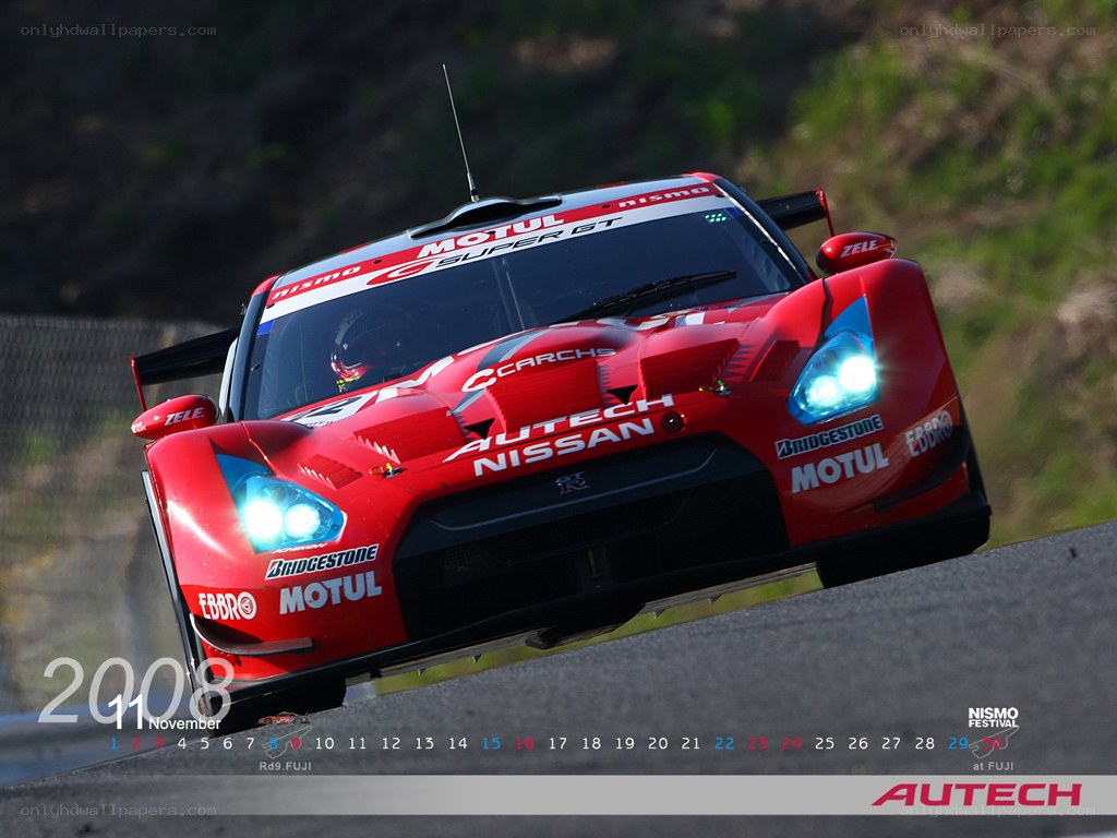 Red race car on track