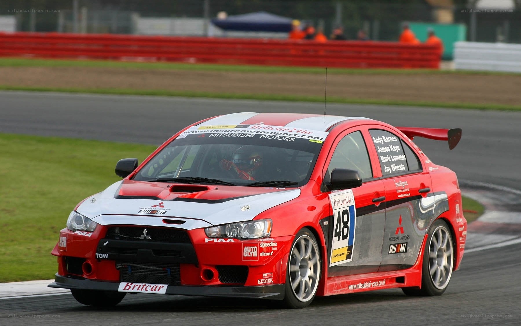 Red race car on track