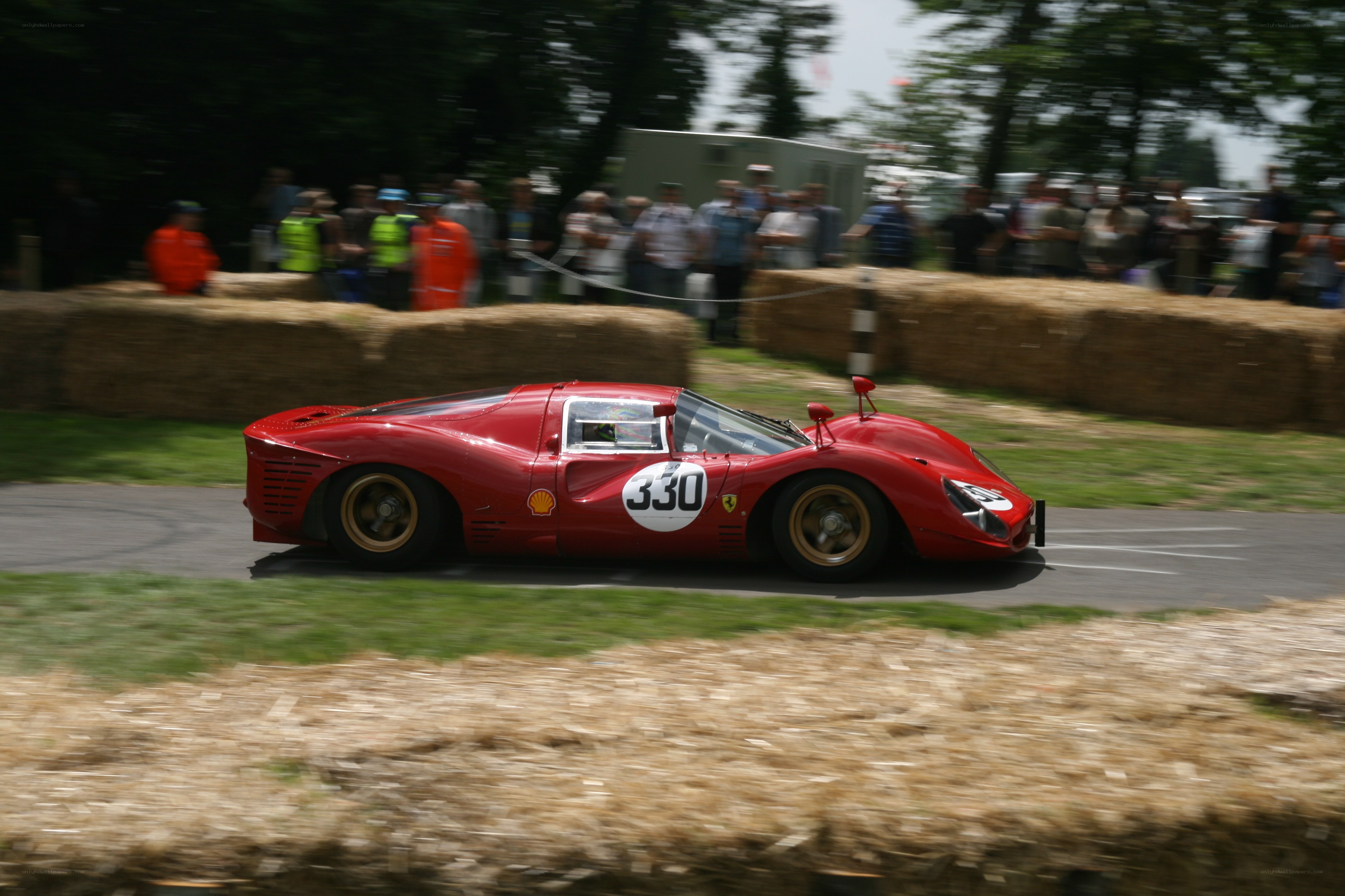 Red race car on track