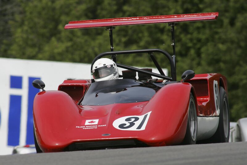 Red race car on track