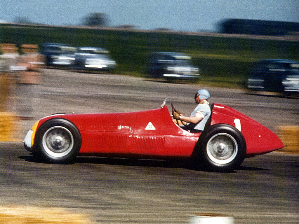 Red race car on track