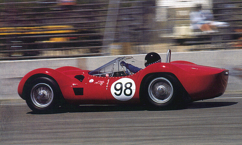 Red race car on track
