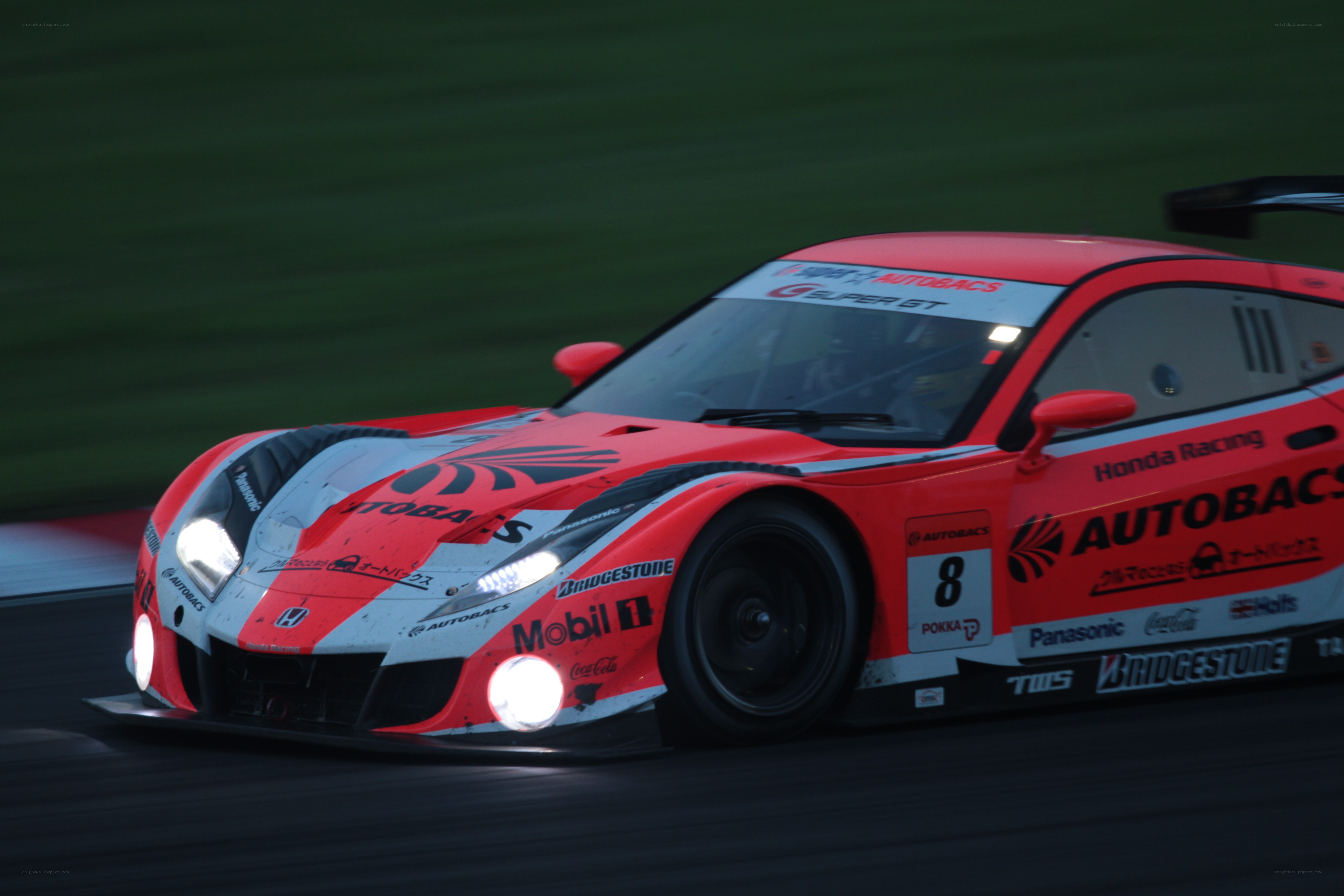 red race car on track
