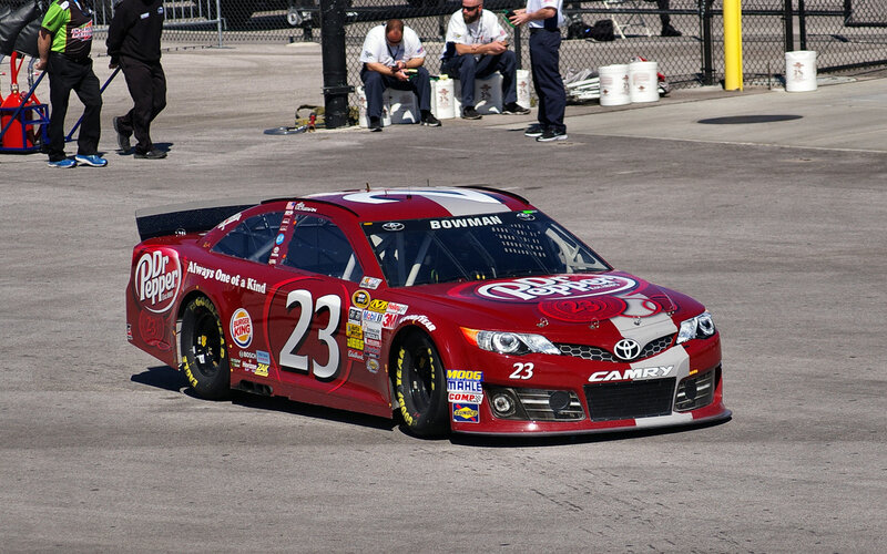 Red Race Car on Track — Active, Afternoon