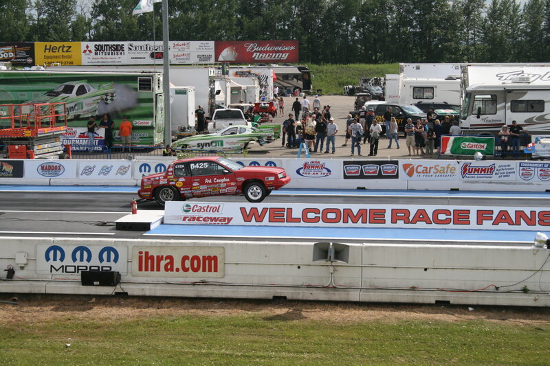 Red Race Car on Track — Active