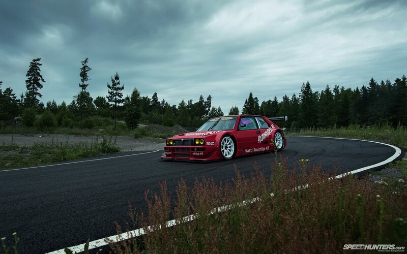 Red Race Car on Track — Dramatic, Afternoon, Photograph, Road