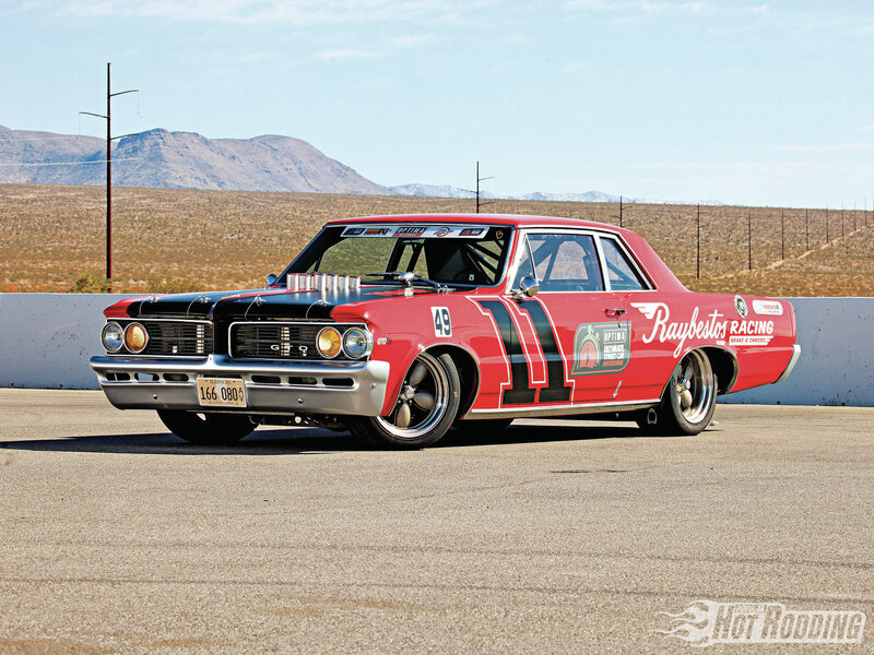 Red Race Car on Track — Dramatic, Afternoon, Photograph