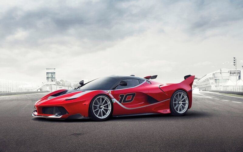 Red Race Car on Track — Dramatic, Photograph, Race Track
