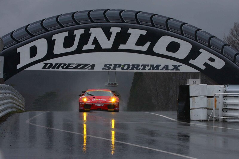 Red Race Car on Track — Dramatic, Winter