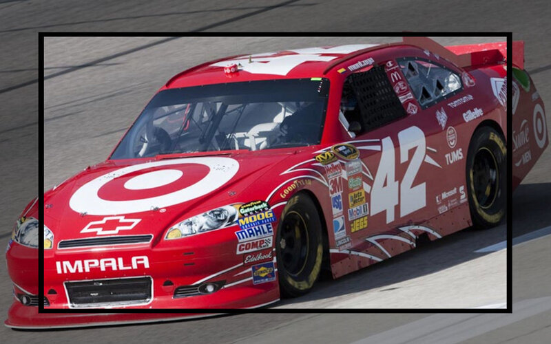 Red Race Car on Track — Dynamic, Afternoon, Photograph, Race Car