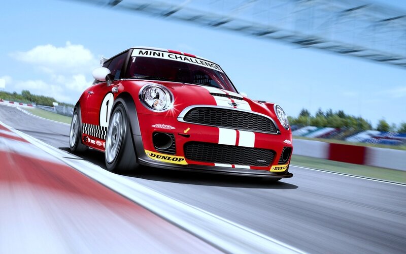 Red Race Car on Track — Dynamic, Afternoon, Photograph, Race Track, Sky