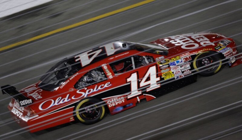 Red Race Car on Track — Dynamic, Night, Photograph, Race Car, Number 14