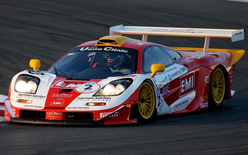 Red Race Car on Track — Dynamic, Sunset, Photograph