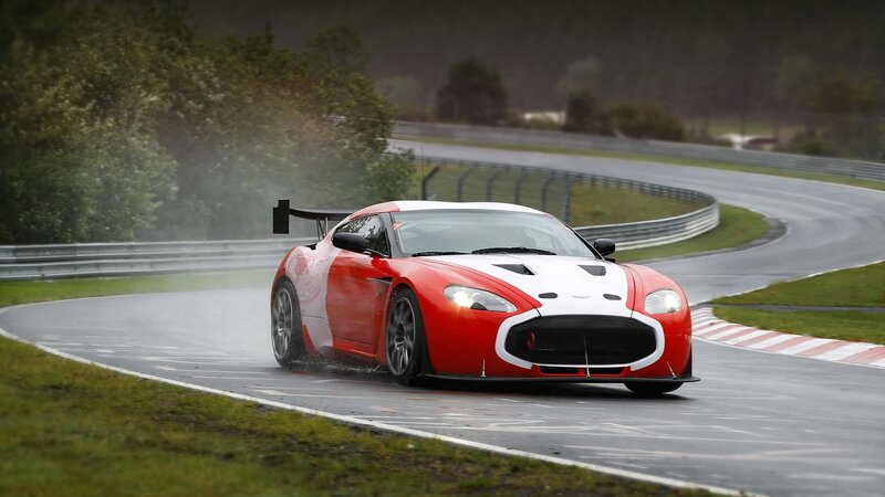 red race car on wet track