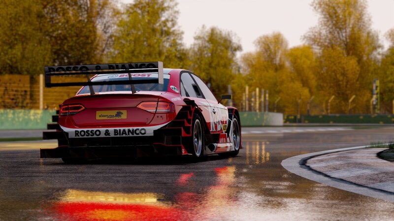 Red race car on wet track