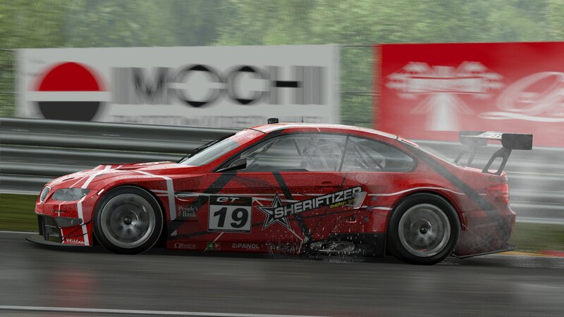 red race car on wet track