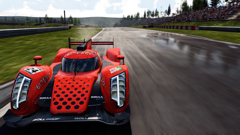 Red race car on wet track