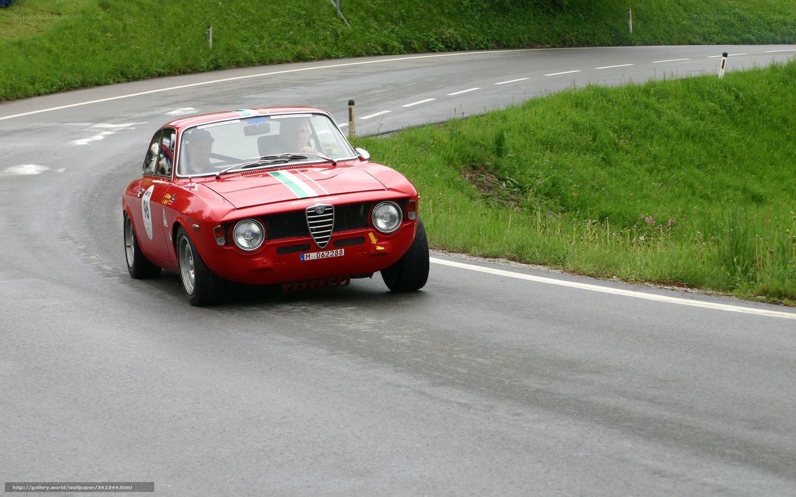 red race car on winding road