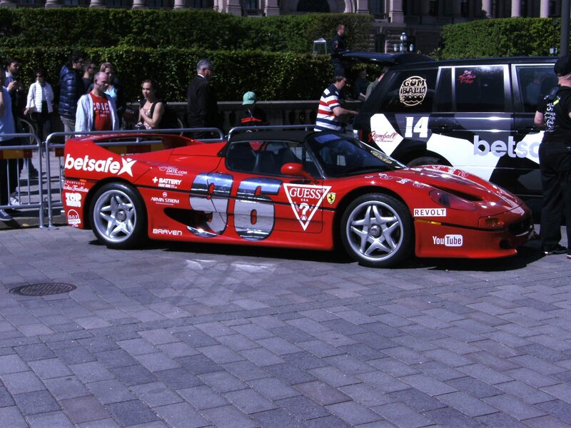 Red Race Car — Outdoor, Afternoon, Photograph, People
