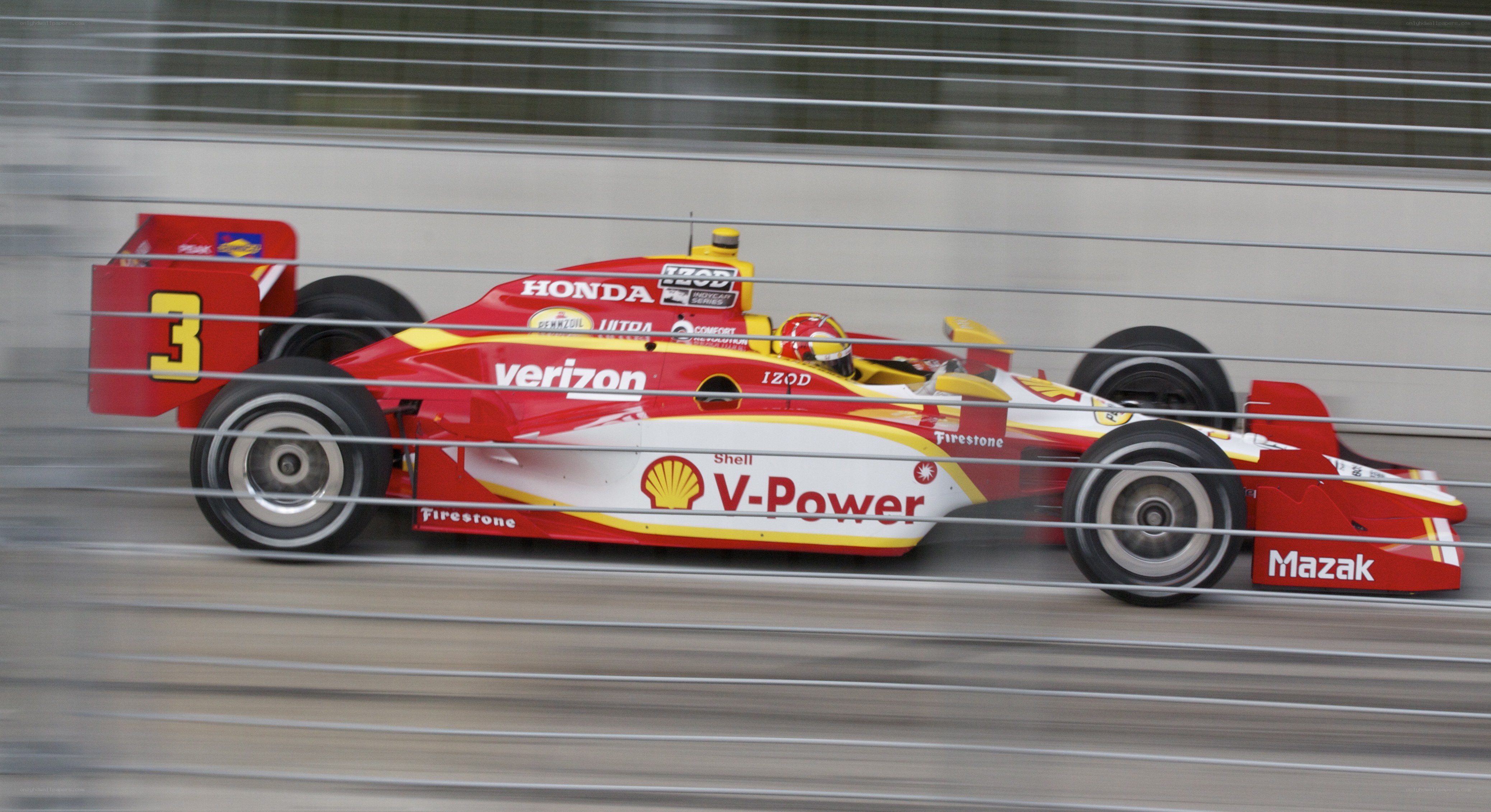Red race car speeding on track
