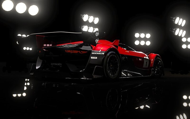 red race car under lights