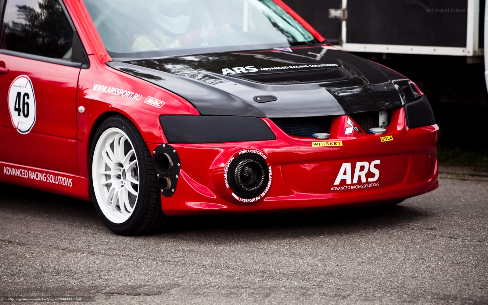 Red race car with ARS branding
