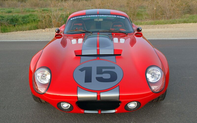 Red race car with number 15