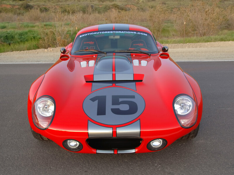 Red race car with number 15