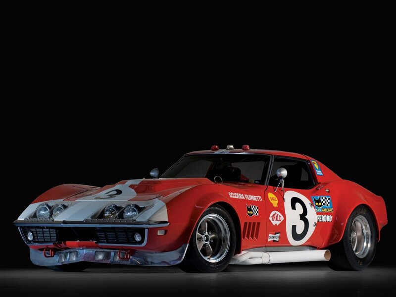 Red race car with number three