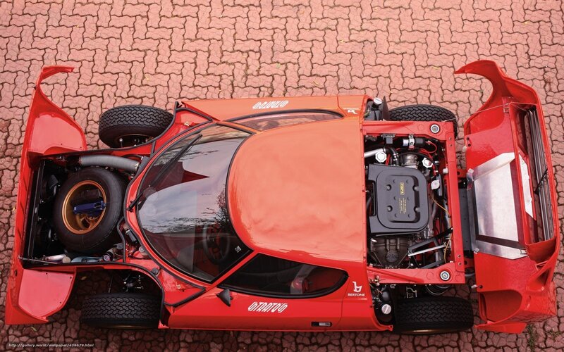 Red race car with open doors