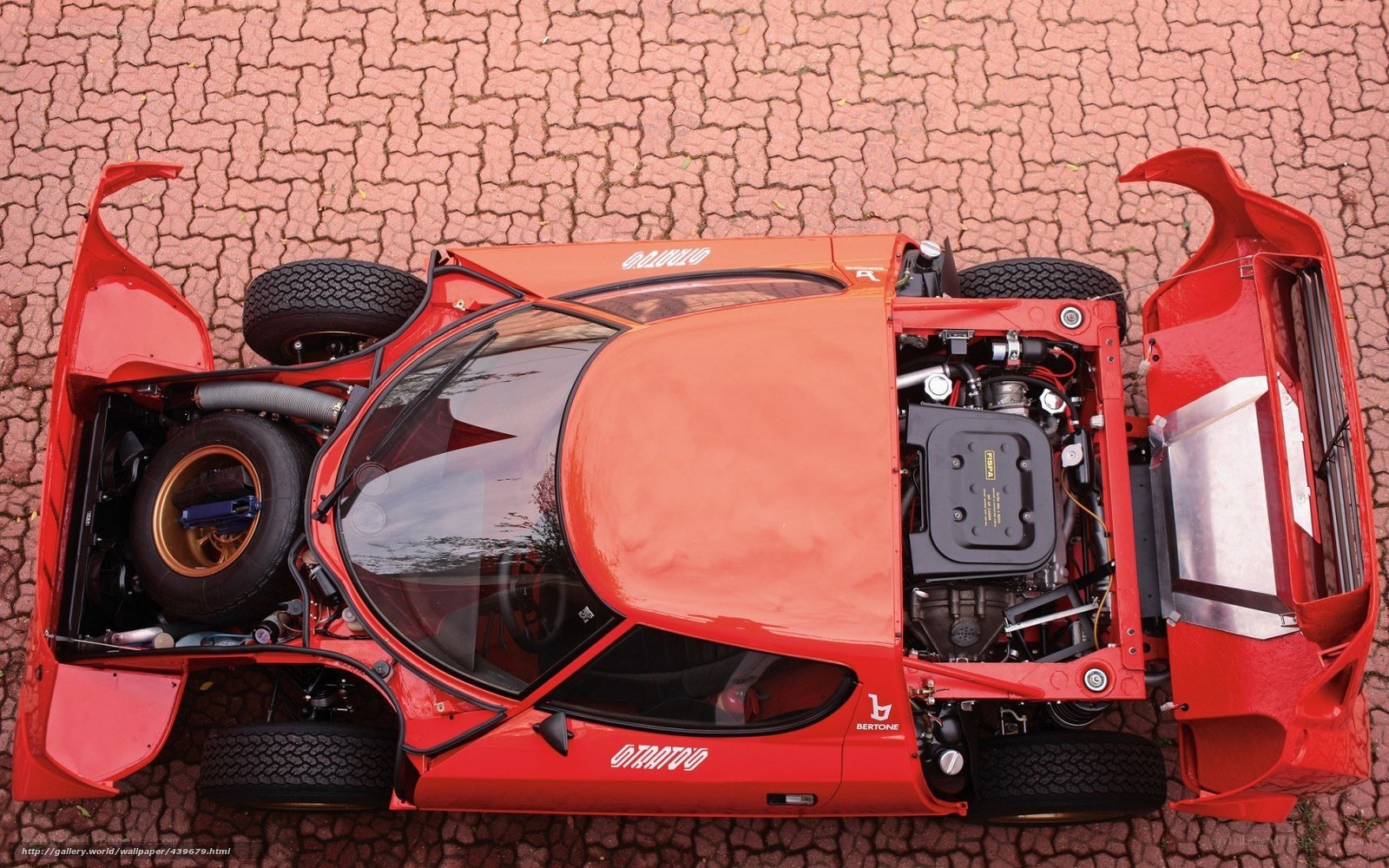 Red race car with open doors