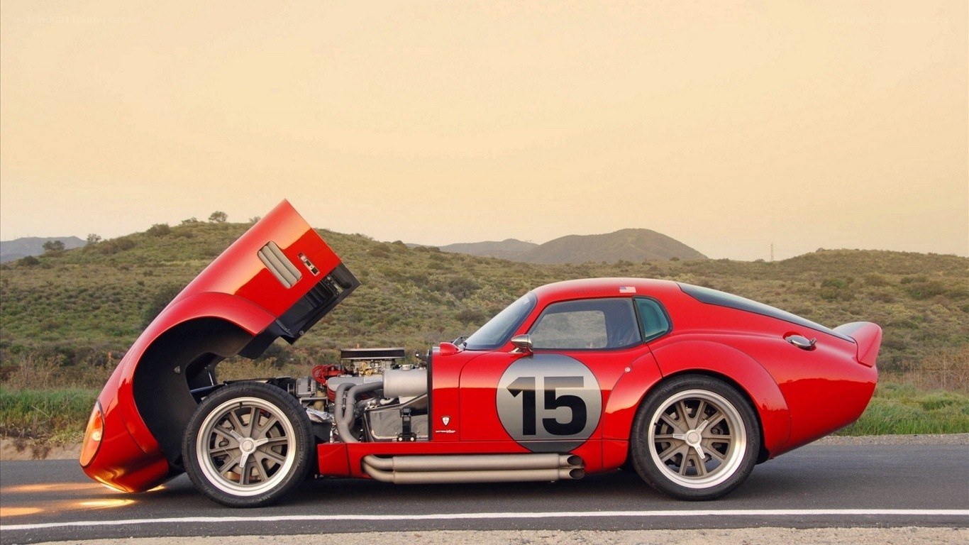 Red race car with open hood