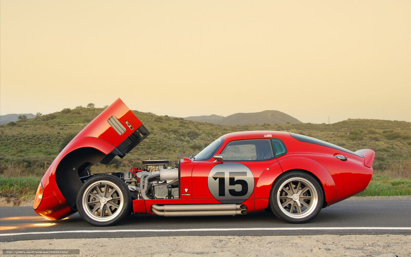 Red race car with open hood