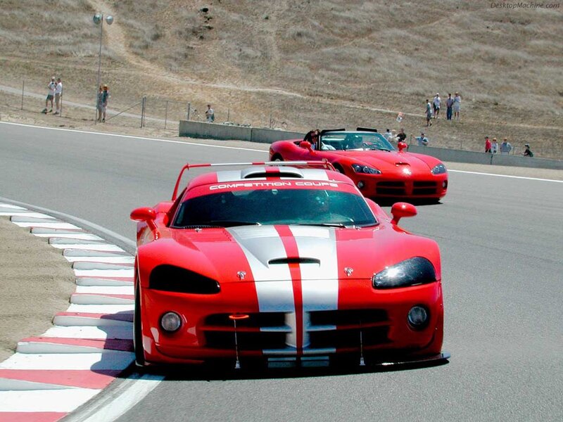 Red race cars on a track