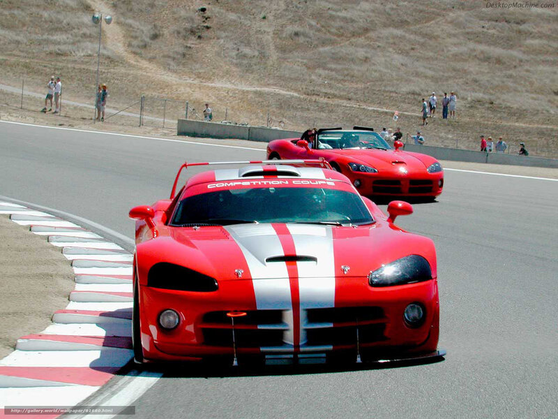 Red race cars on a track