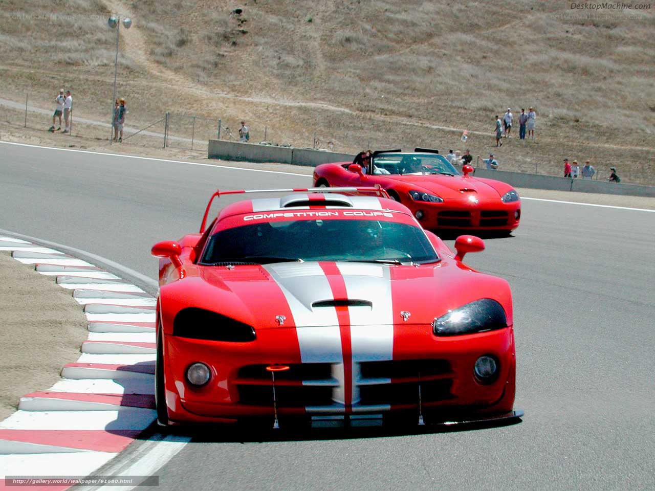 Red race cars on a track