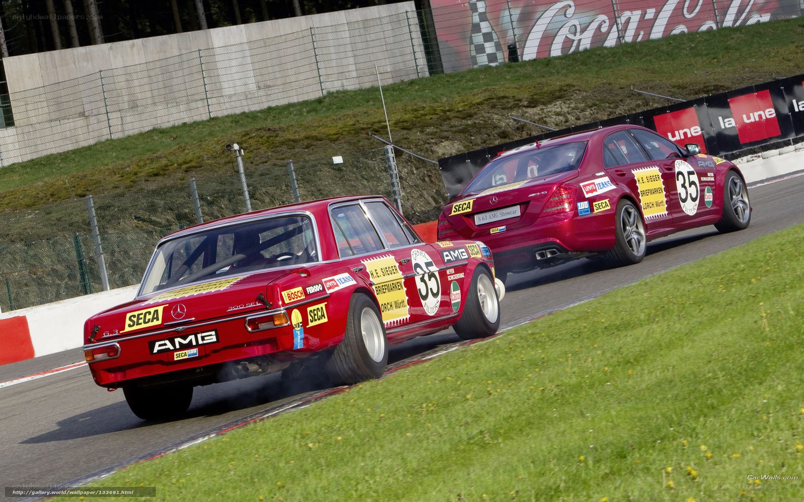 Red race cars on track