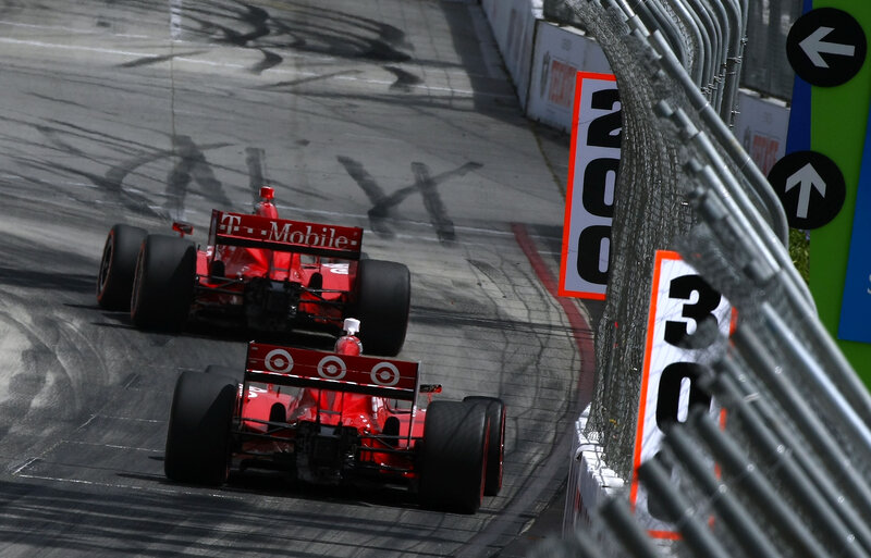 Red race cars on track