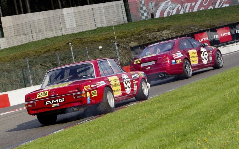 Red race cars on track