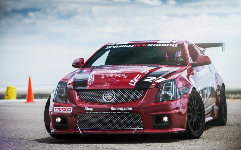 Red Racing Car — Dynamic, Afternoon, Photograph, Driver