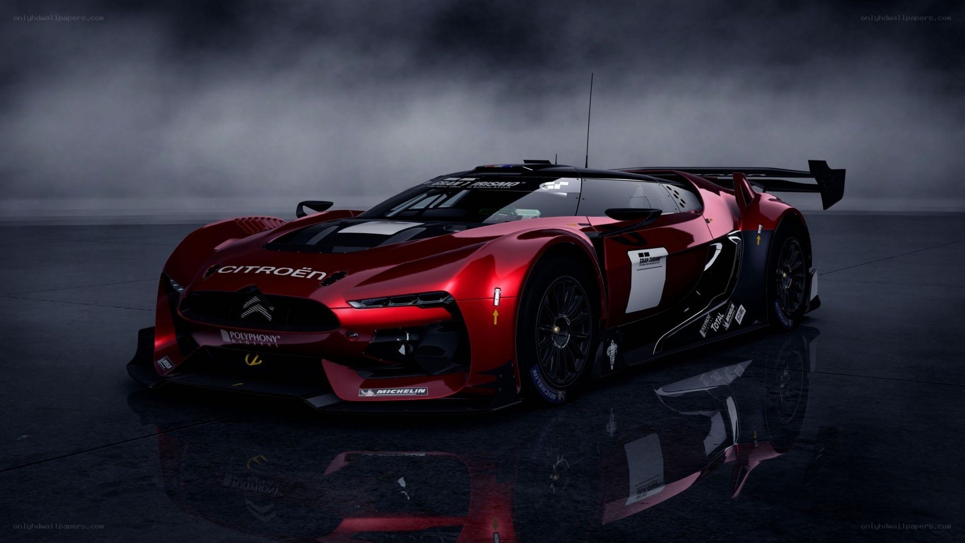 red racing car in mist