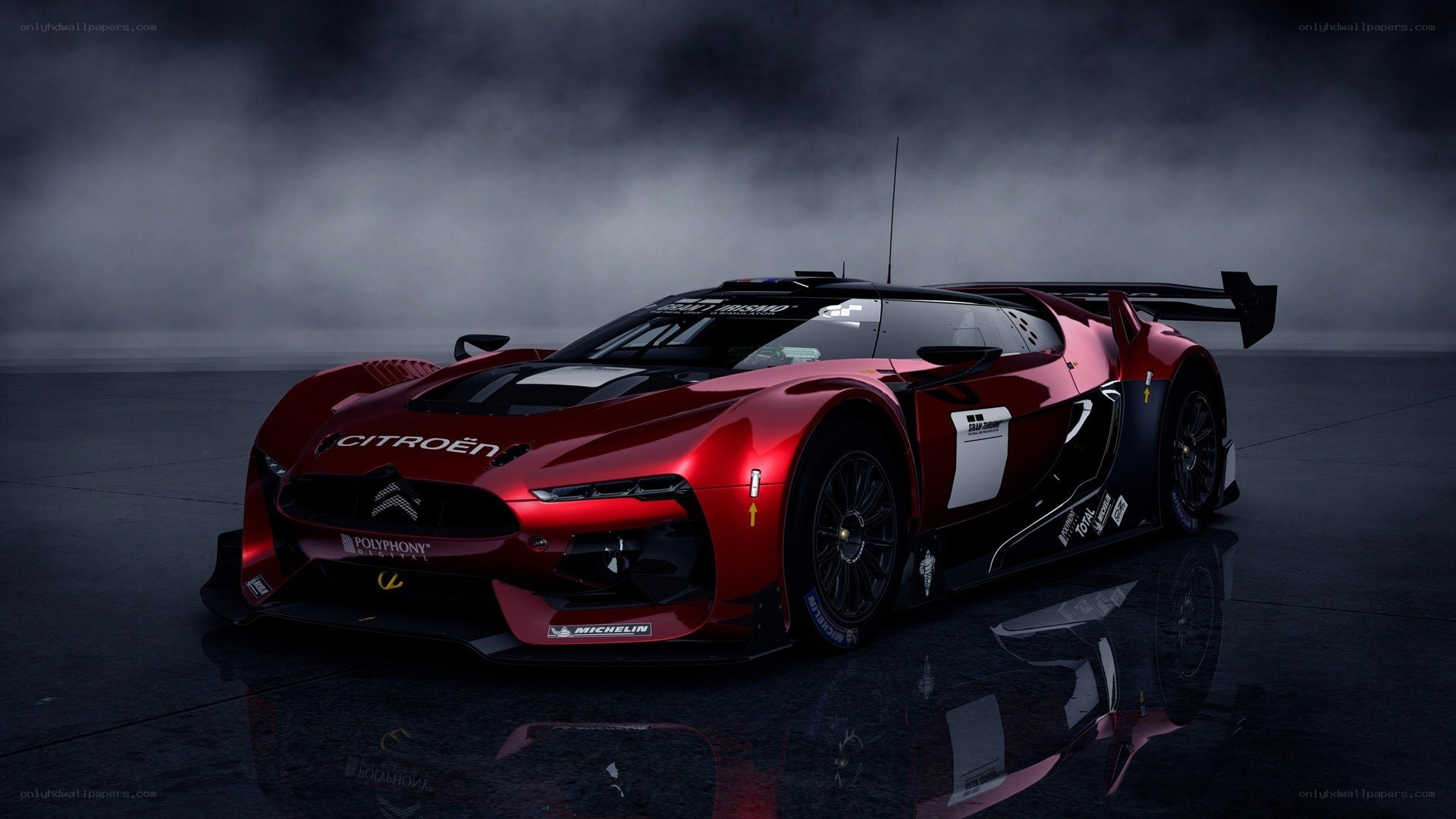 red racing car in mist