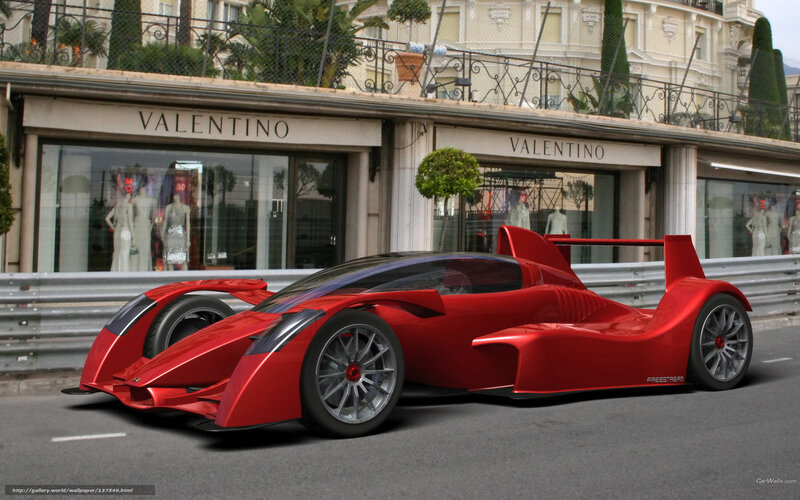 Red racing car on city street
