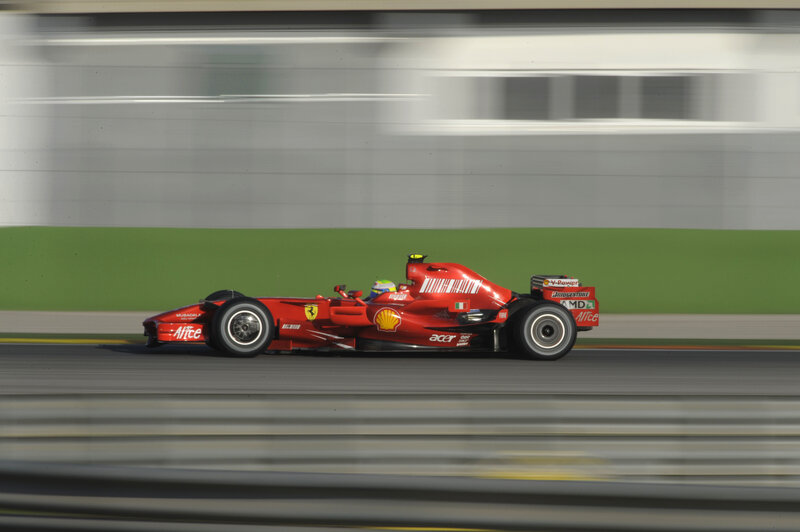 Red racing car on track
