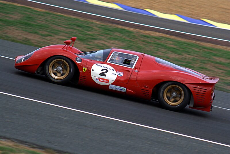 Red racing car on track