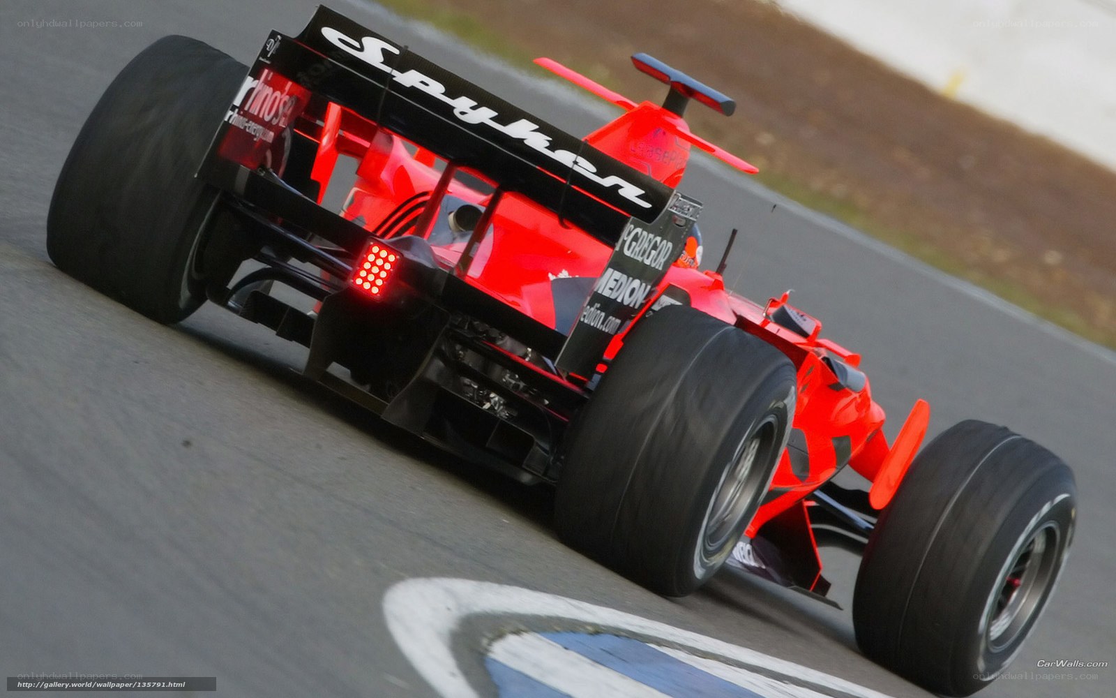 Red racing car on track