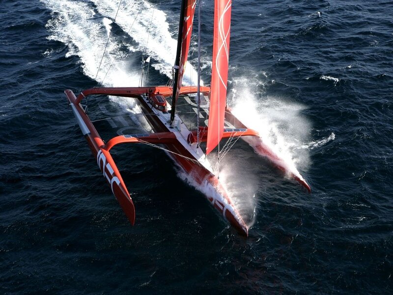 Red Racing Catamaran — Dynamic, Afternoon