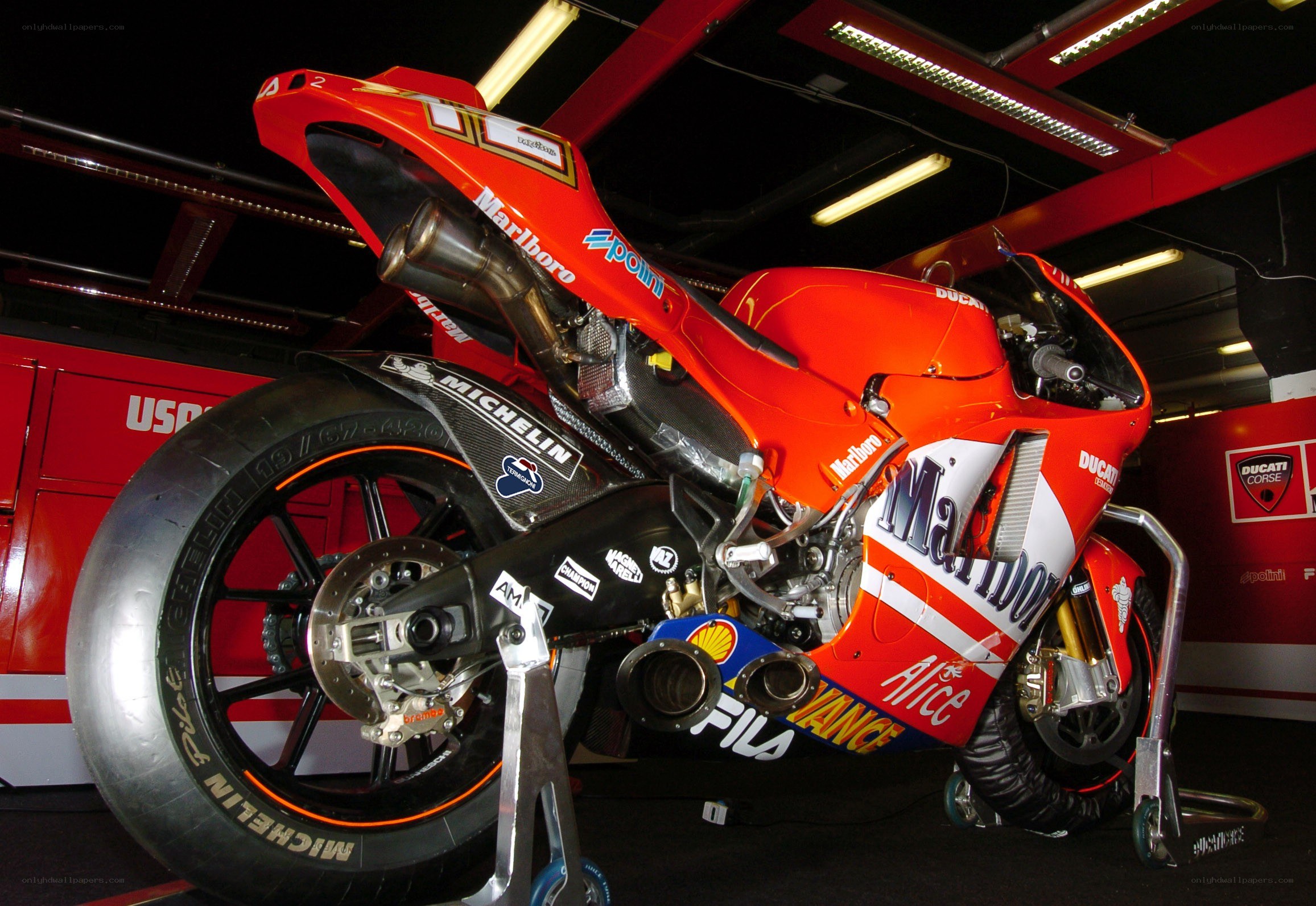Red racing motorcycle in garage