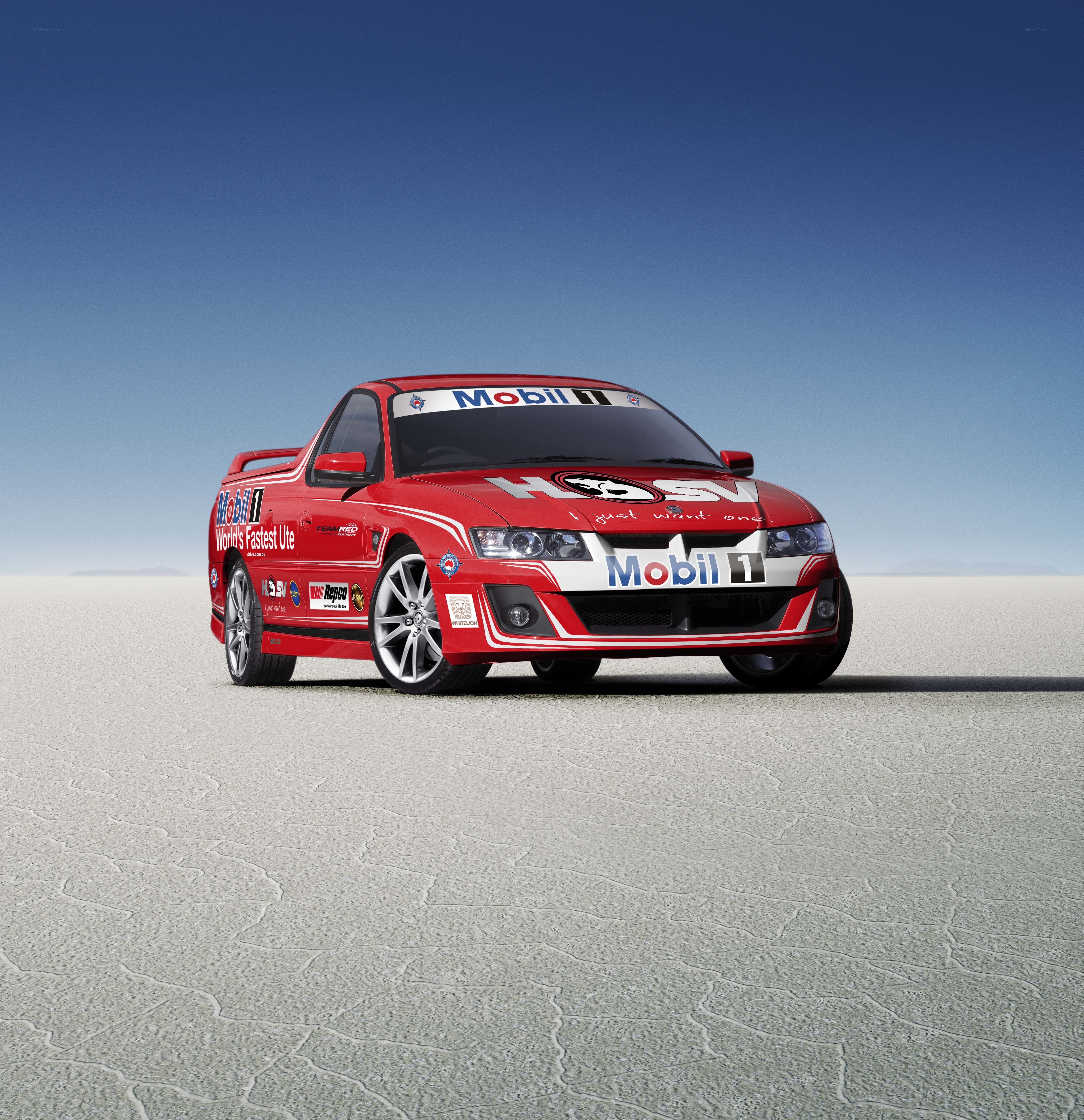 Red racing pickup on salt flat