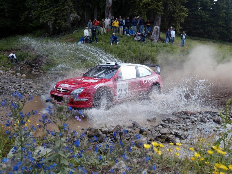 Red Rally Car — Dynamic, Afternoon, Photograph, Spectators